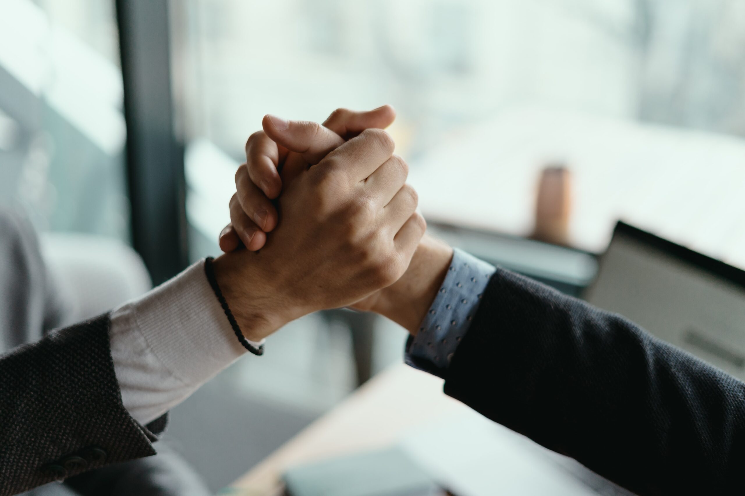 https://bashawari.com/wp-content/uploads/2024/11/two-business-men-celebrating-deal-min-scaled.jpg